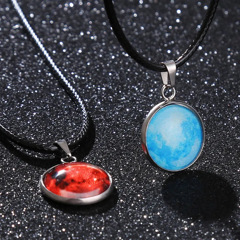 Constellation night sky pendant necklace with luminous alloy and organic glass on an adjustable chain.