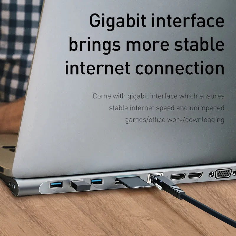 Grey aluminium USB C docking station with ten ports including HDMI, VGA, and Ethernet