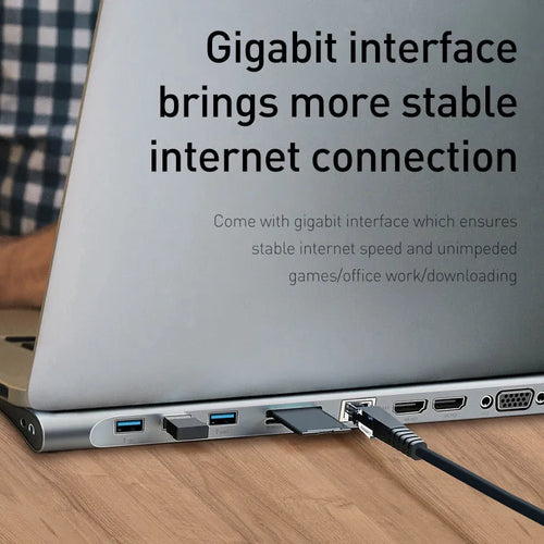 Grey aluminium USB C docking station with ten ports including HDMI, VGA, and Ethernet