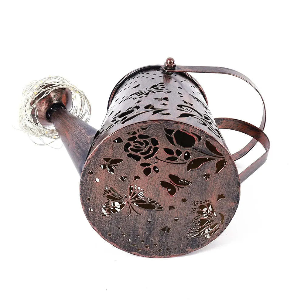 Tapered butterfly pattern solar garden lamp with iron construction and warm white finish