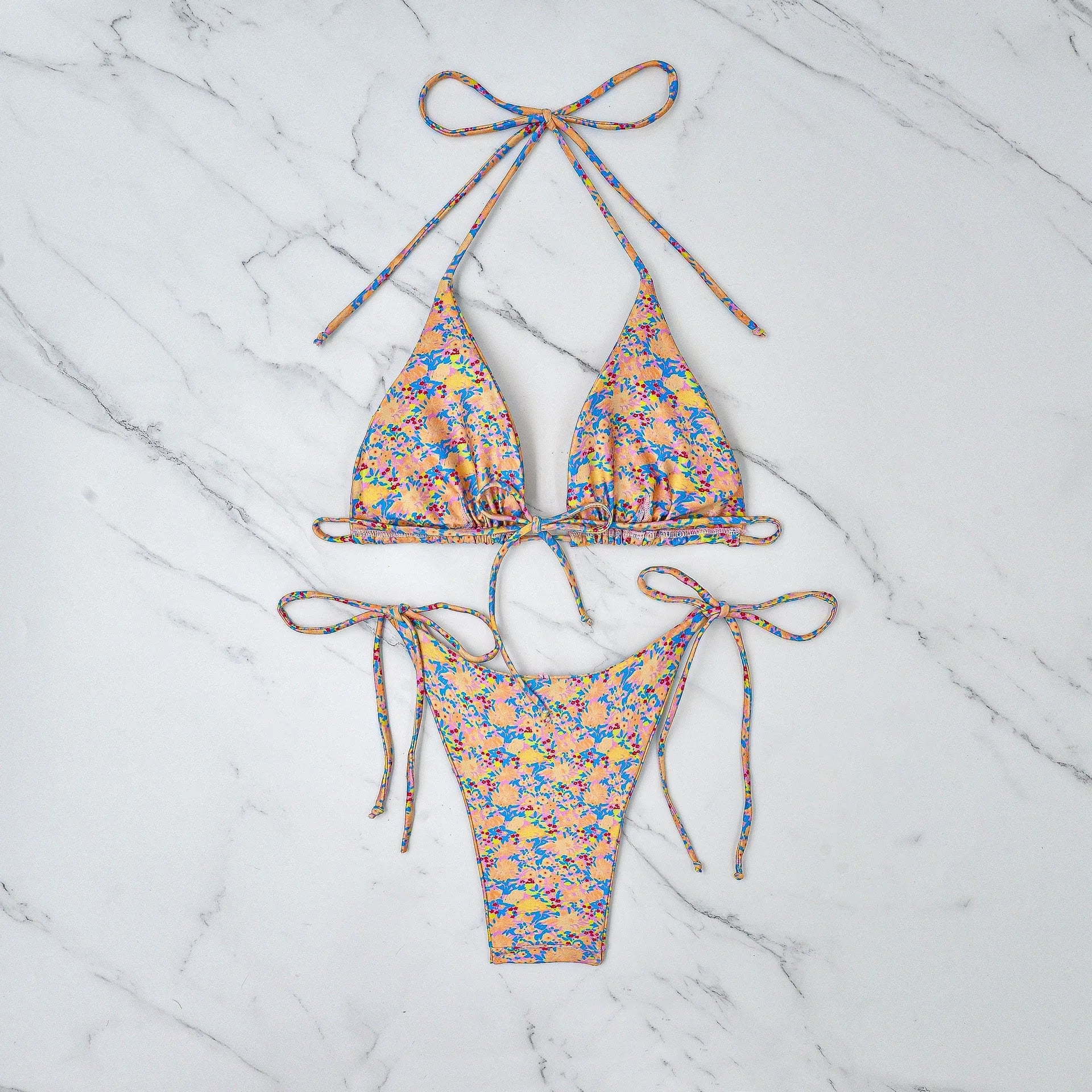 Lace-up front bikini top and briefs in picture colour, a polyester swimsuit set for water sports.