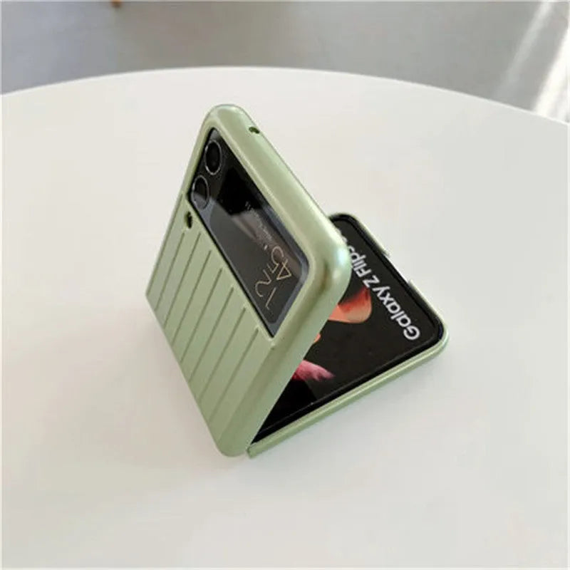 Samsung Z Flip3 flip case in PC material showing colour options: black, red, pink, silver, gold, blue, green.
