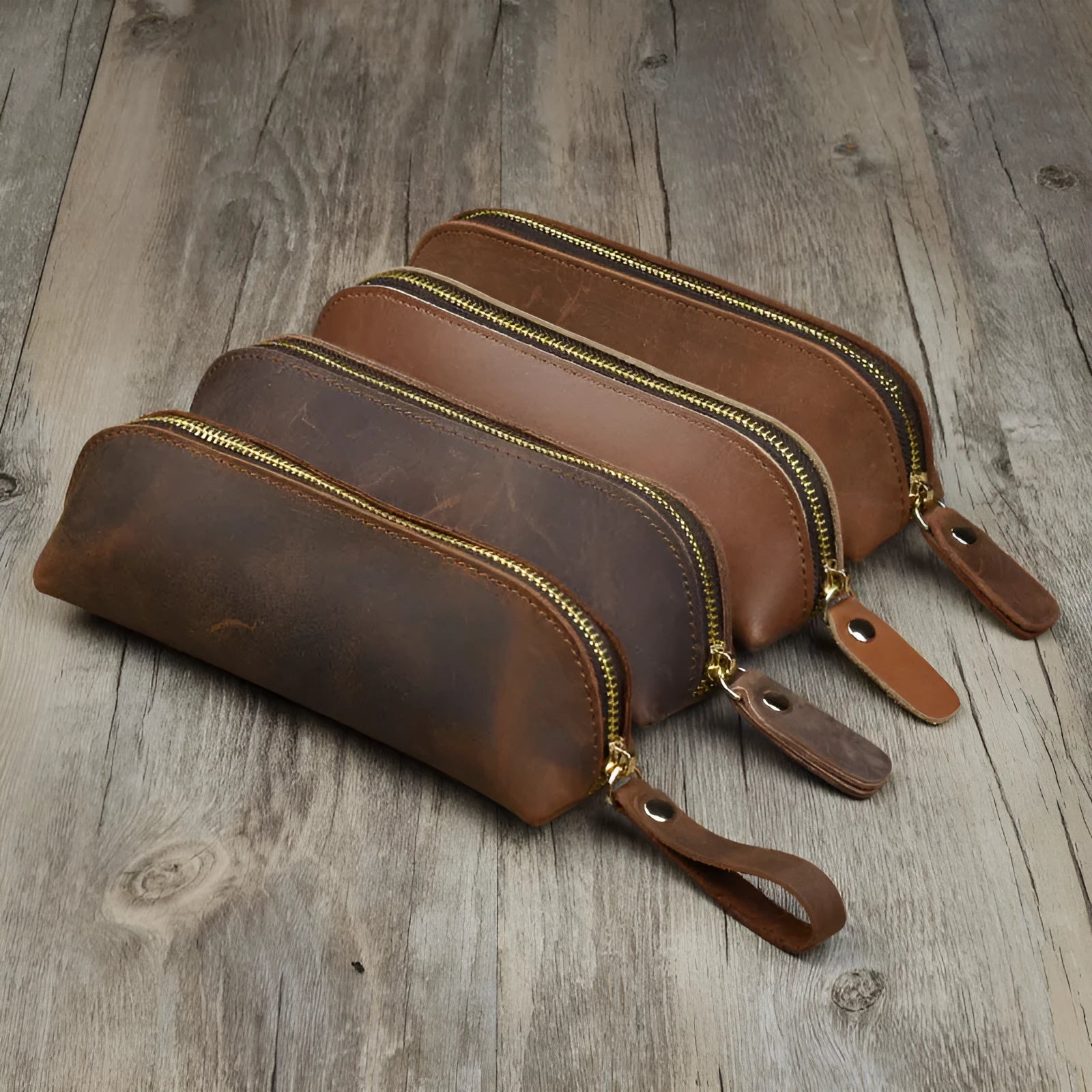 Handmade cowhide leather pencil case with zipper closure showing square 18cm x 6cm x 6cm dimensions