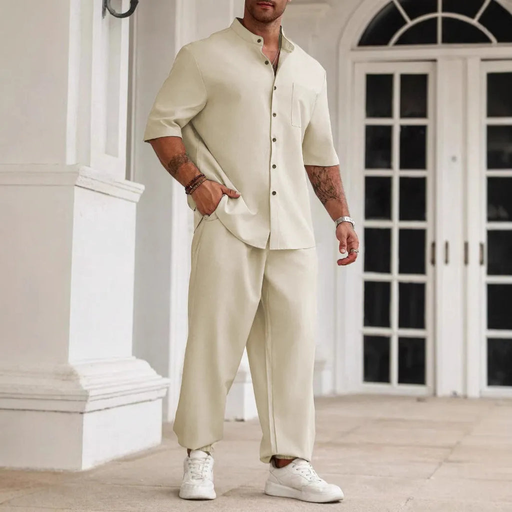 Men's apricot coloured cotton linen casual short-sleeved shirt and trouser set laid flat.
