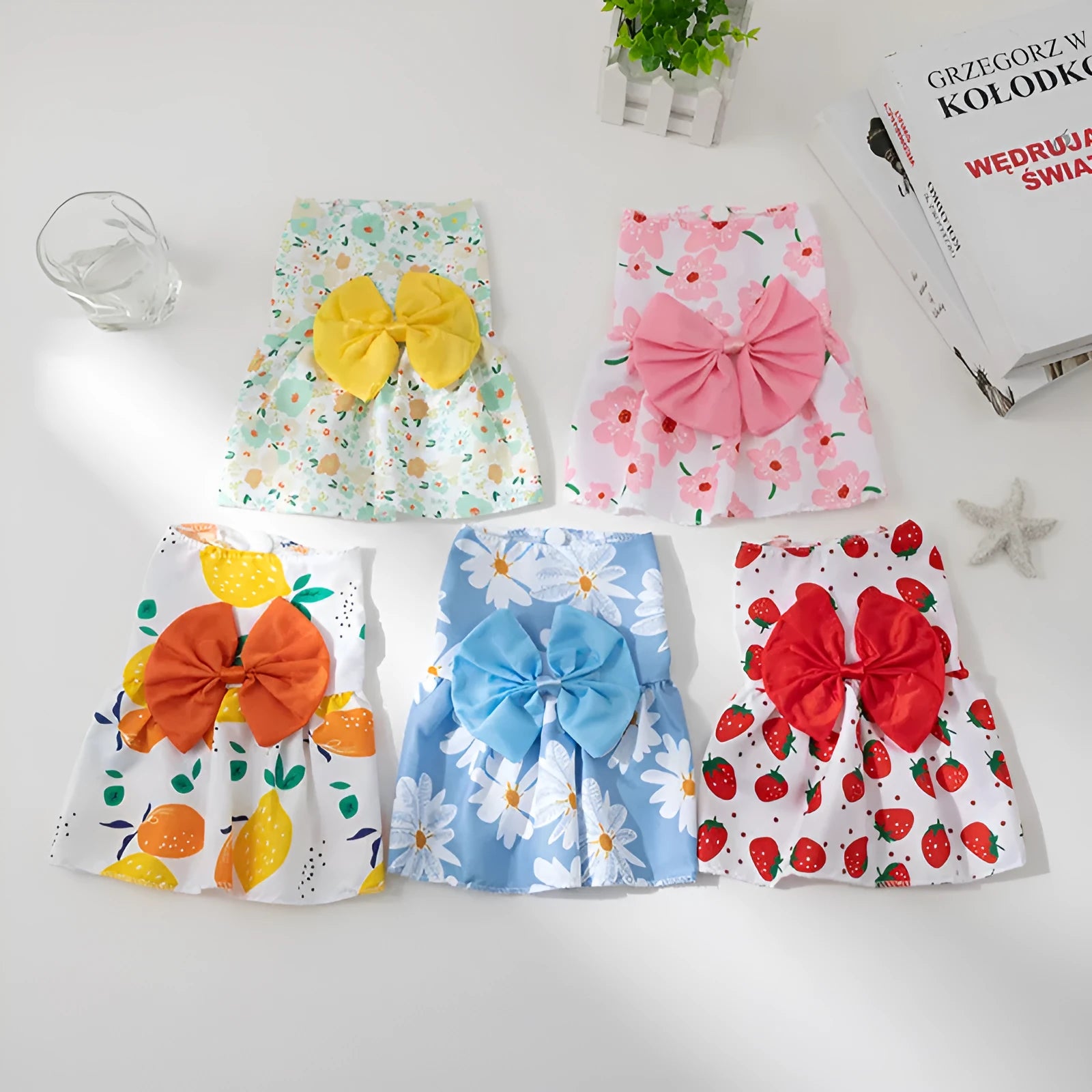 Ultra-thin polyester pet dress with floral butterfly patterns and decorative coloured bow