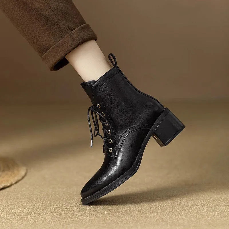 Women's black pointed-toe ankle boots with 5.5cm heel and artificial PU leather upper