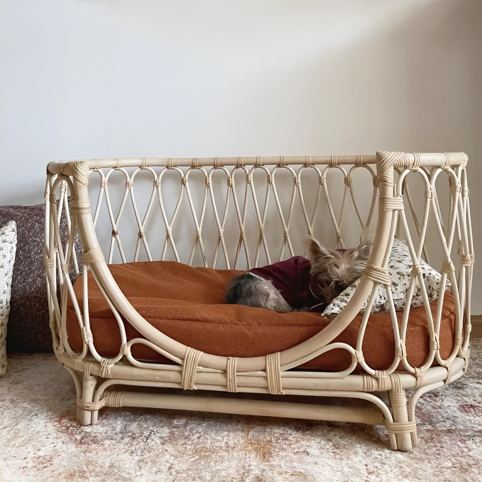 Handmade rattan woven pet bed for dogs and cats in natural brown colour