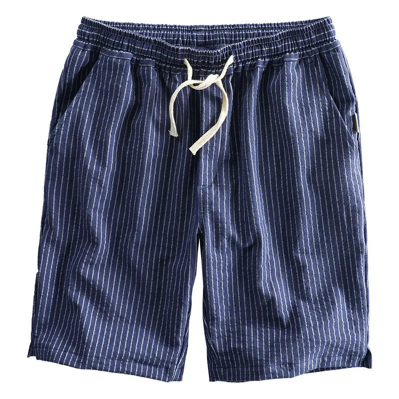 Men's striped casual loose straight shorts in cotton fabric on a hanger