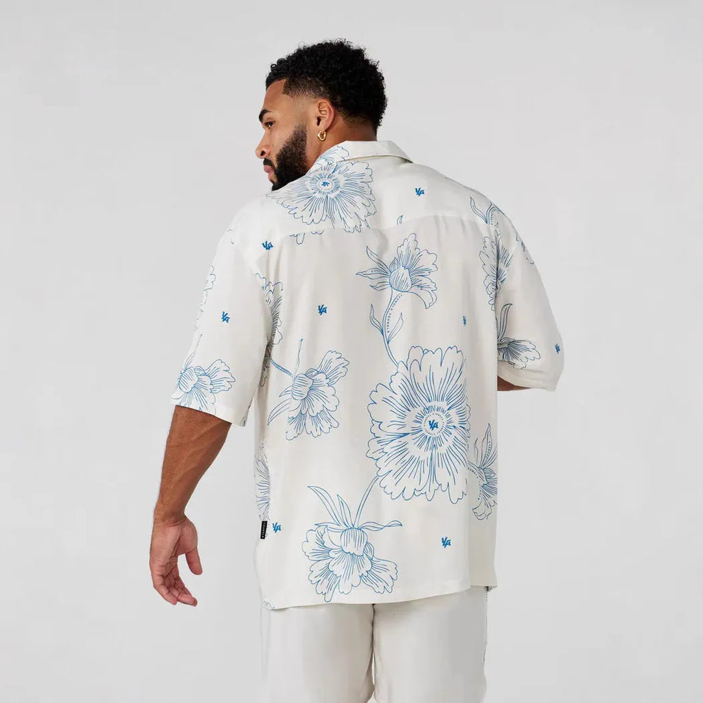 Men's floral printed loose short sleeve top in light colours with cardigan style