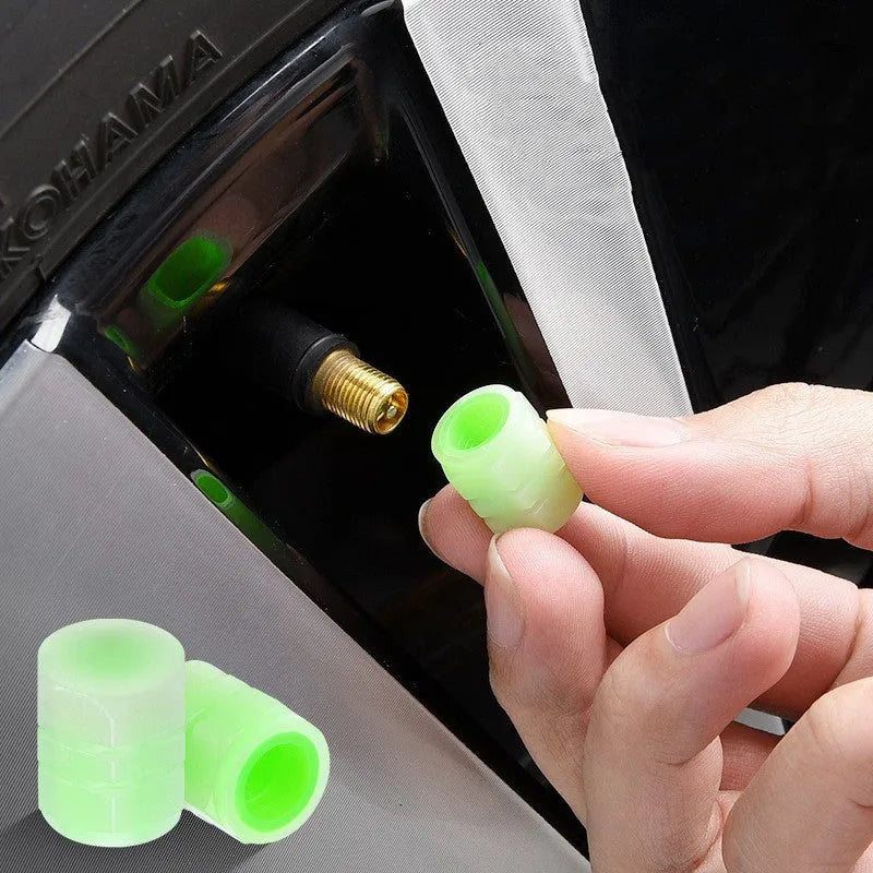 Glow-in-the-dark car valve caps showing rubber construction and luminous properties