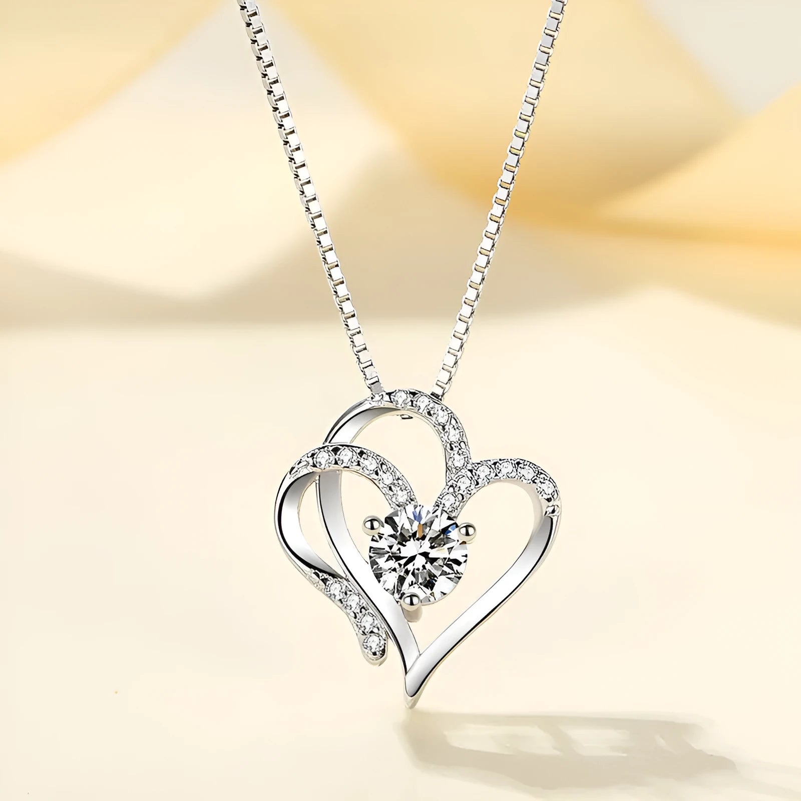 925 silver heart-shaped necklace in platinum, gold and rose gold colours with diamond treatment