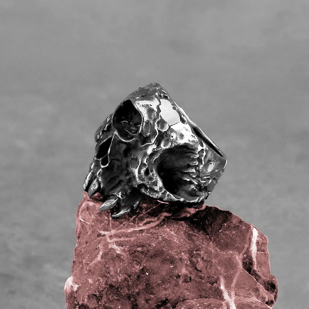 Alloy ring with a one-eyed skull design in a retro hip hop punk style.