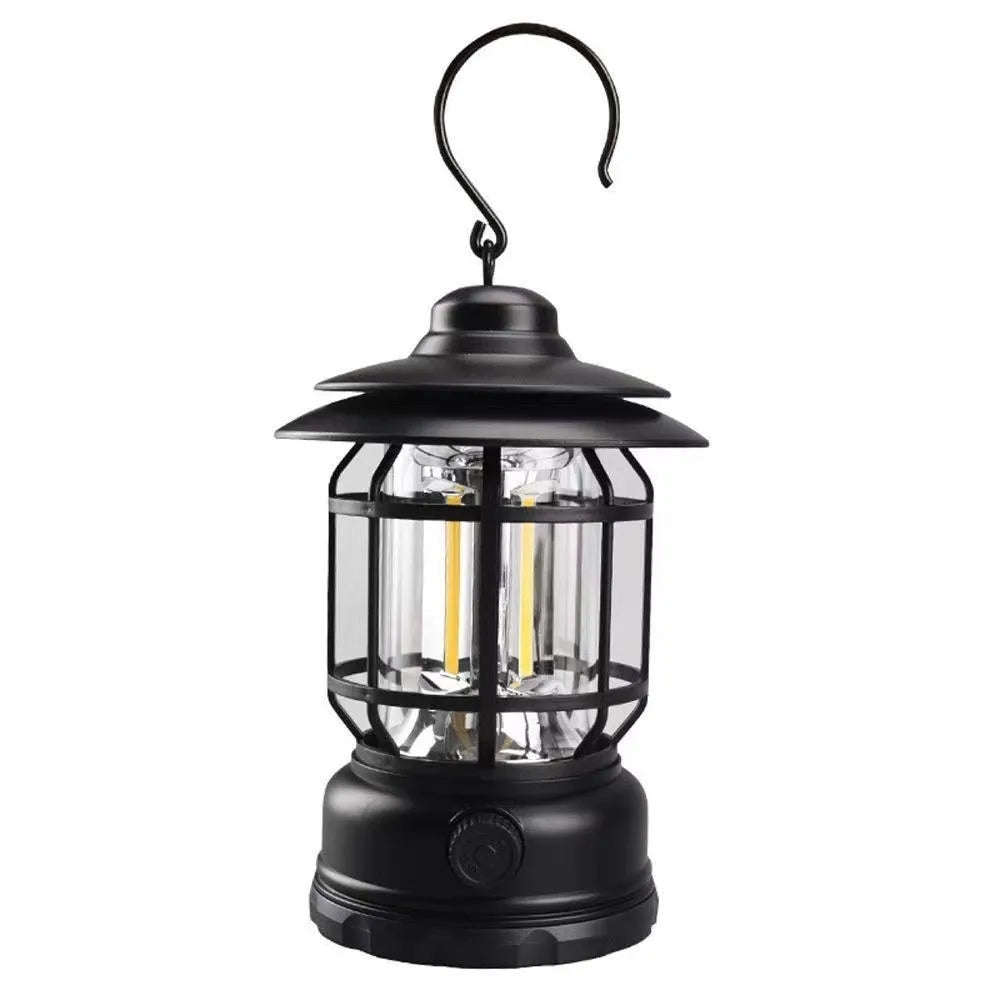 Portable camping lantern with handle in black, dark green, or red colour options.