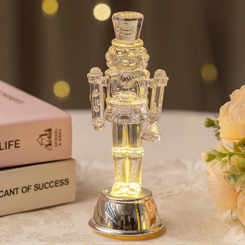 Transparent plastic soldier nutcracker Christmas decoration on desktop