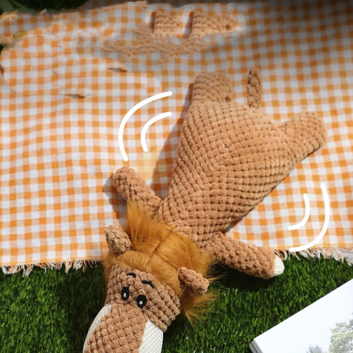 Plush corn cob dog toy in green with textured surface and squeaker for teeth cleaning