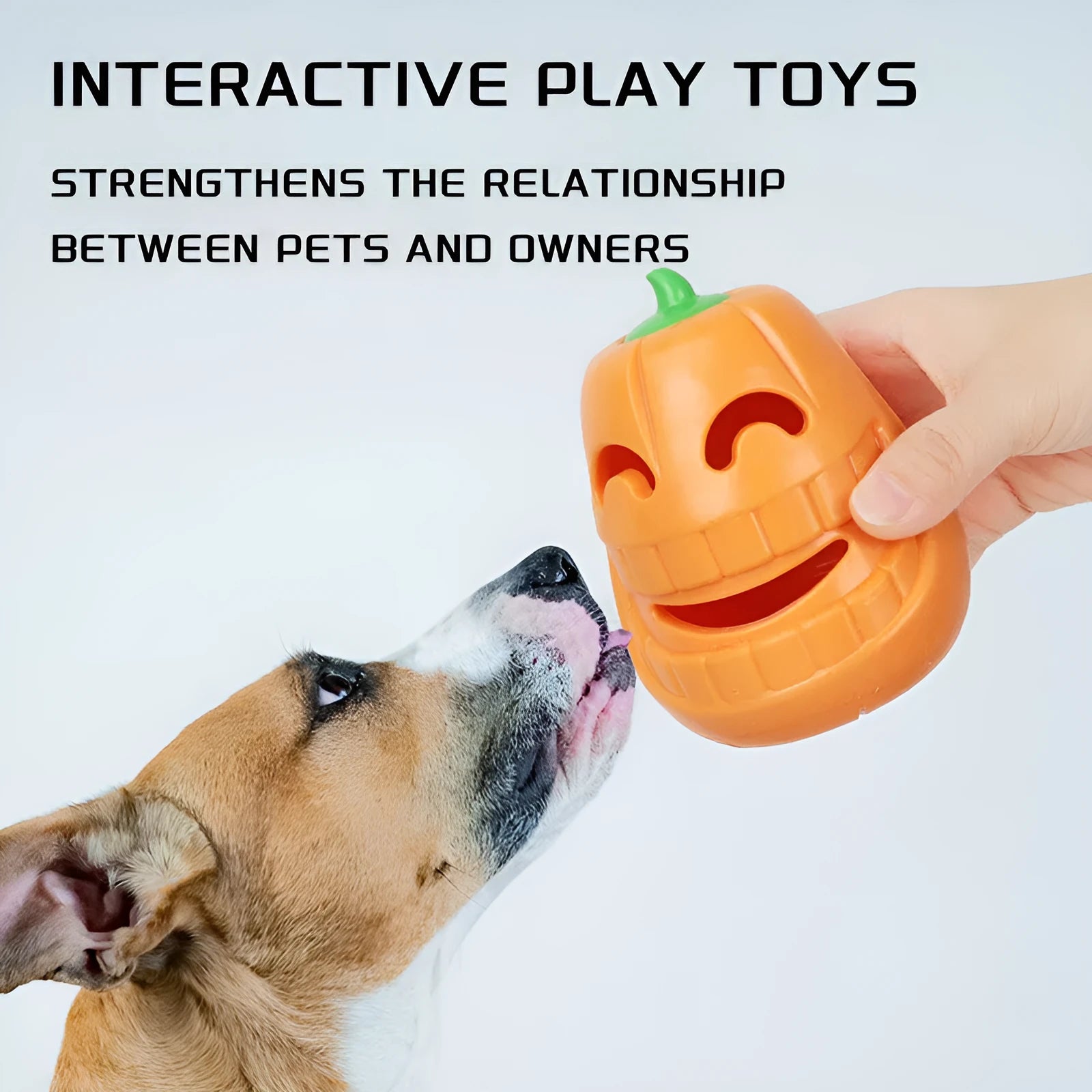 Orange Halloween pumpkin shaped dog chew toy with a funnel opening for treats.