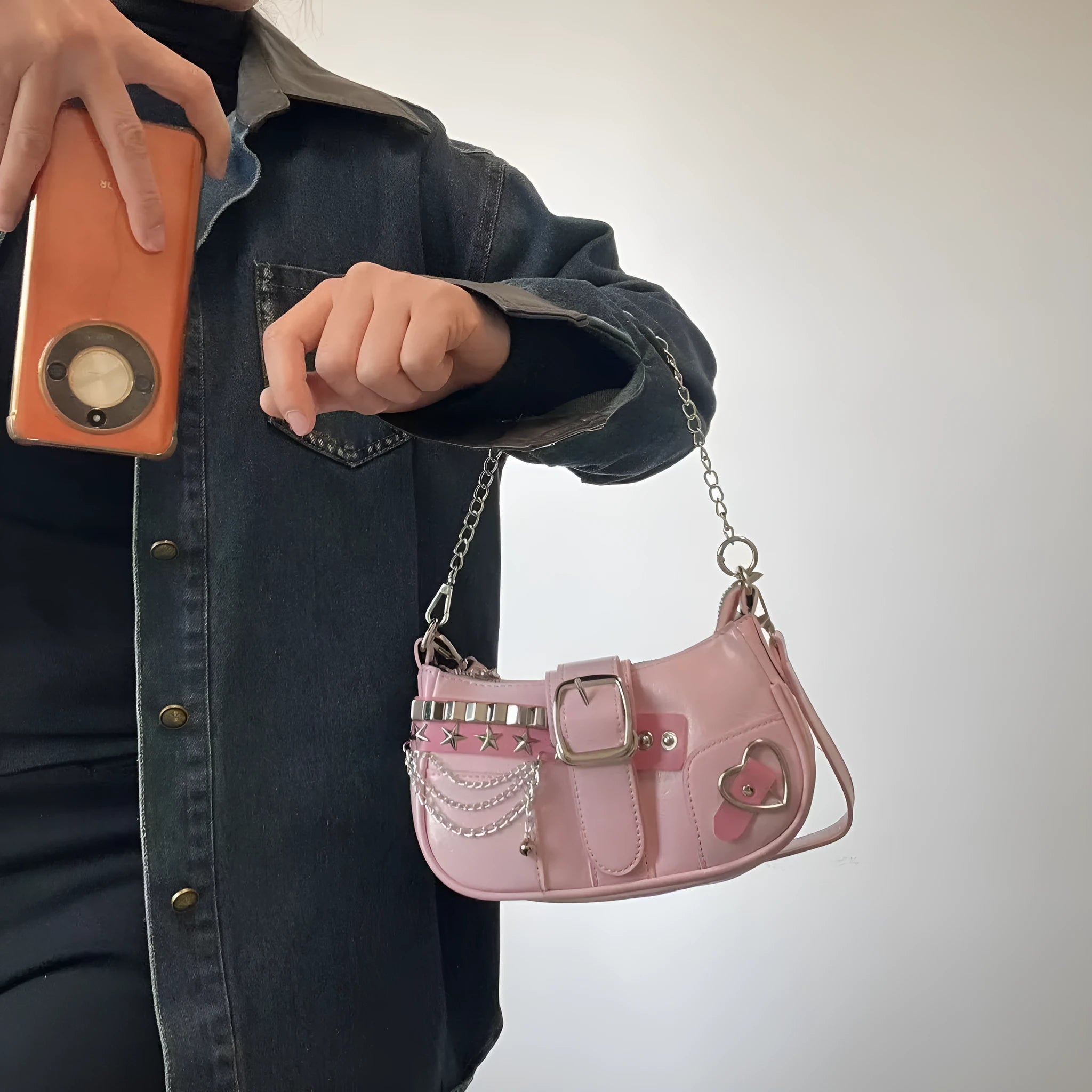 Women's soft PU underarm bag in pink with chain detail and three-dimensional outer pocket