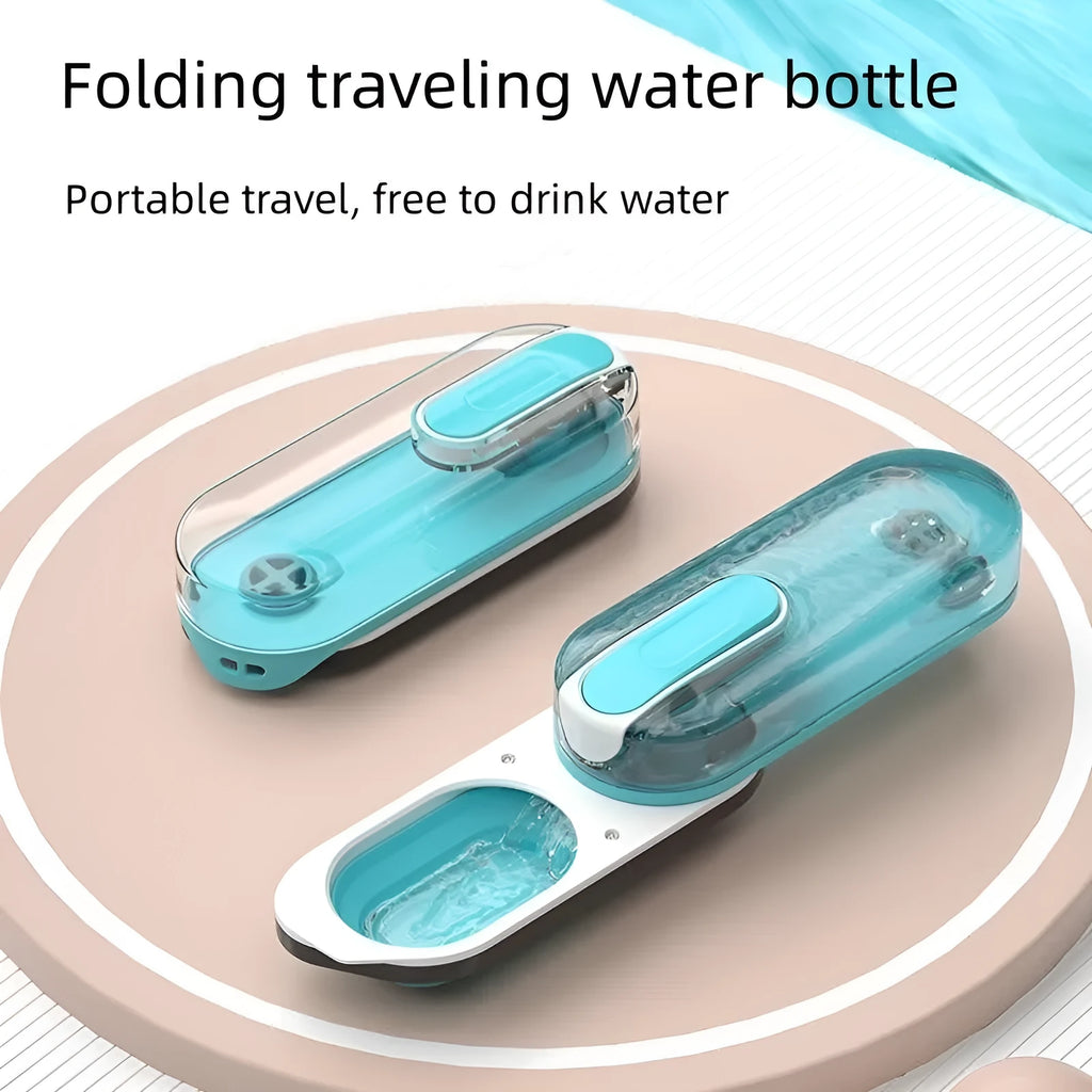 Portable blue pet water bottle with foldable silicone drinking bowl attached, shown with carabiner clip.