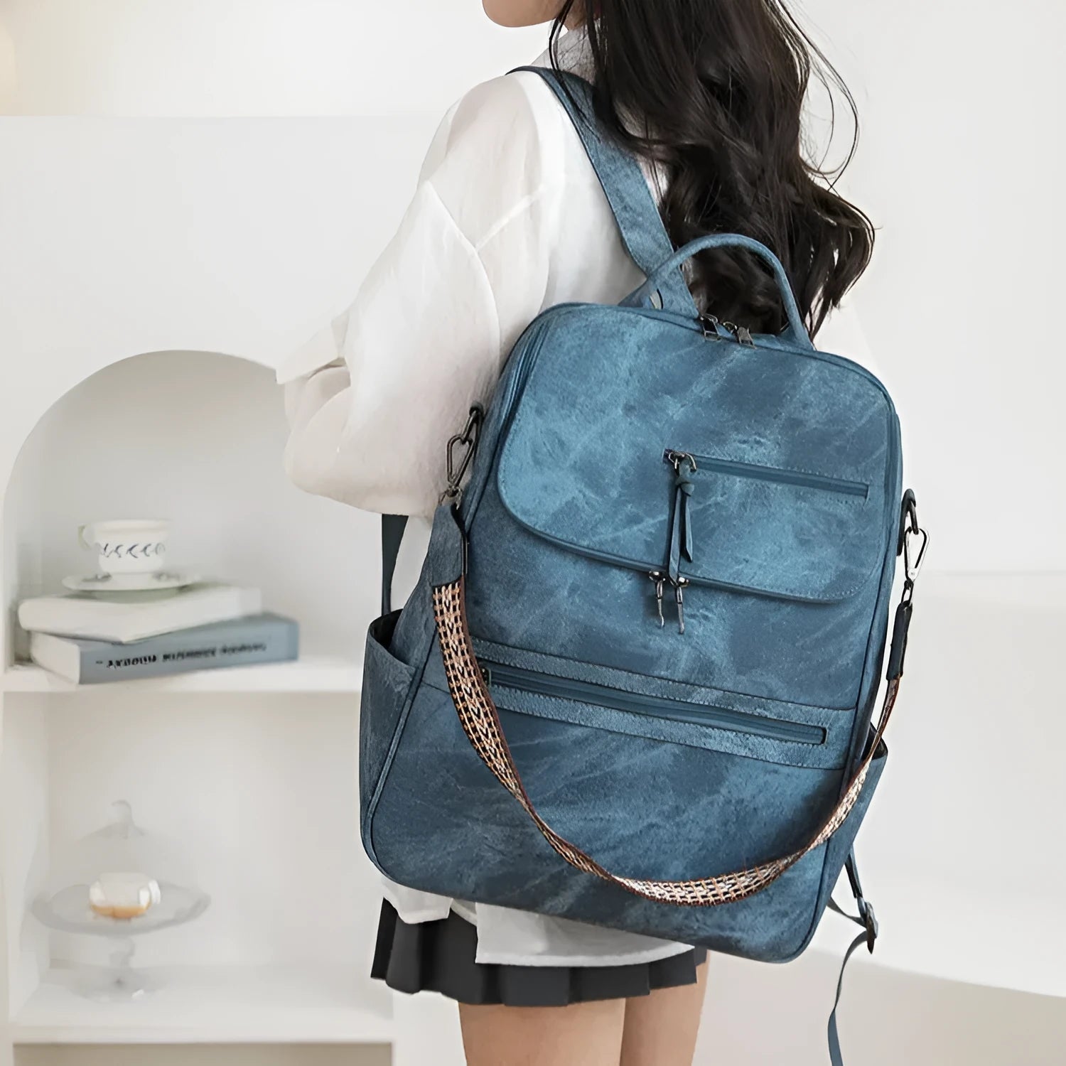 Retro style college backpack in urban simplicity design with curved shoulder strap, shown in available colours.