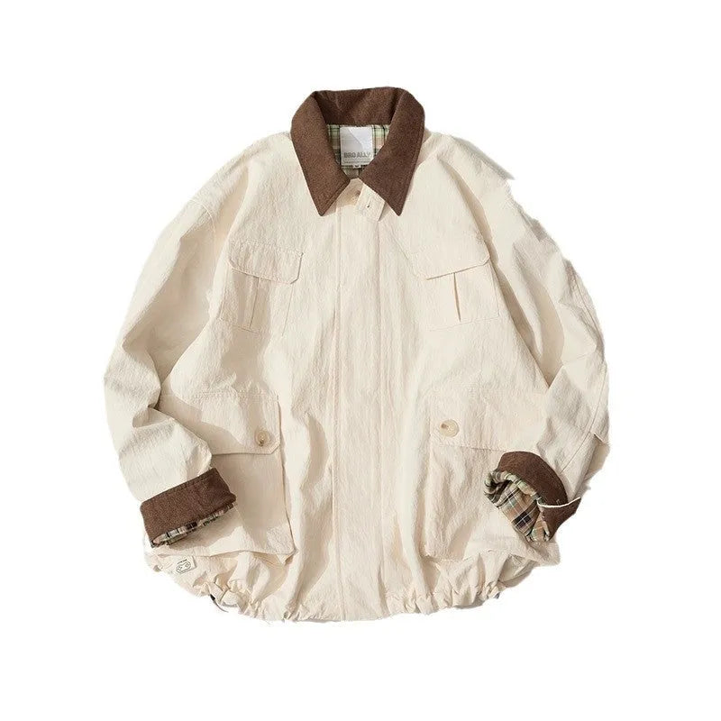 Green solid colour casual jacket with long sleeves and side seam pockets on a hanger