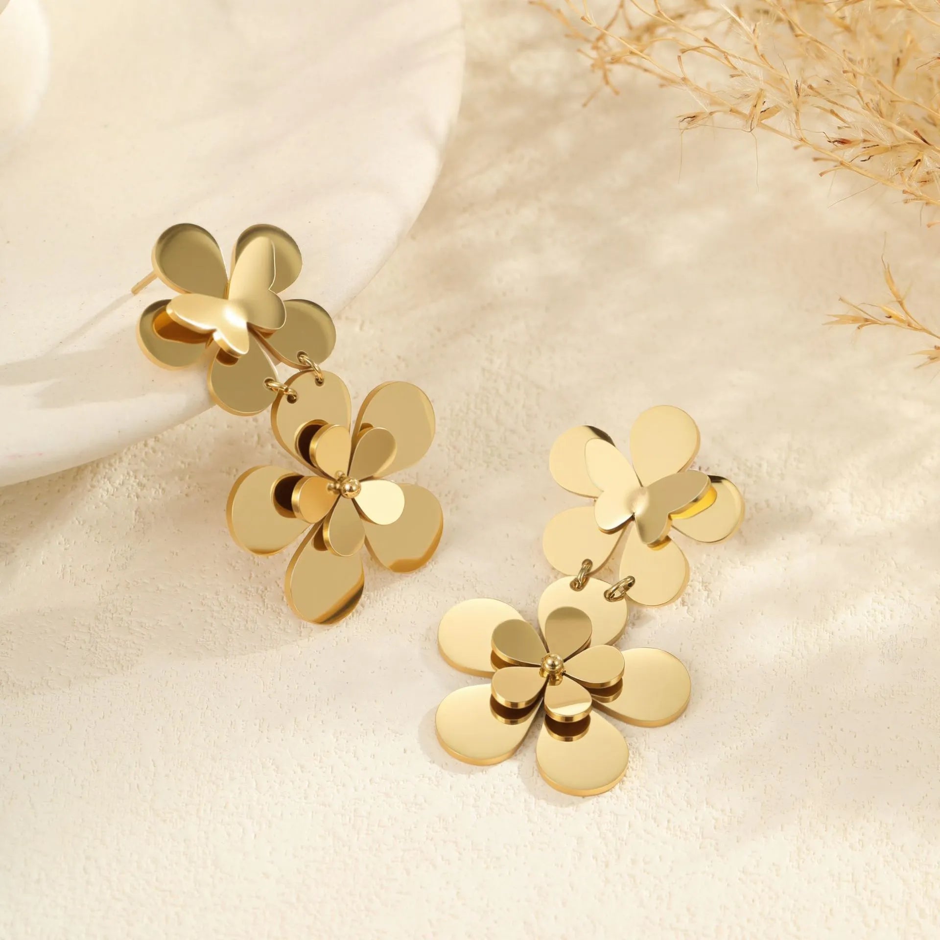 Gold flower butterfly stainless steel earrings with geometric design and 18K electroplated finish
