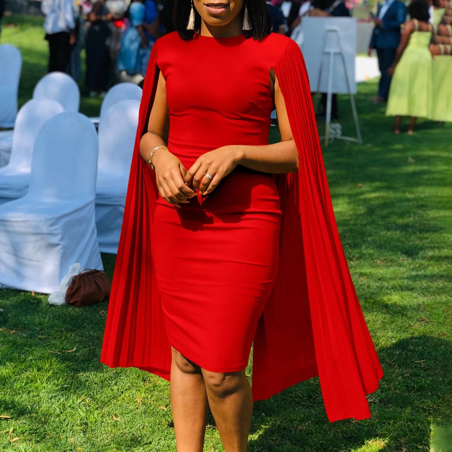 Long sleeve evening gown with pleated shawl collar and high waist design