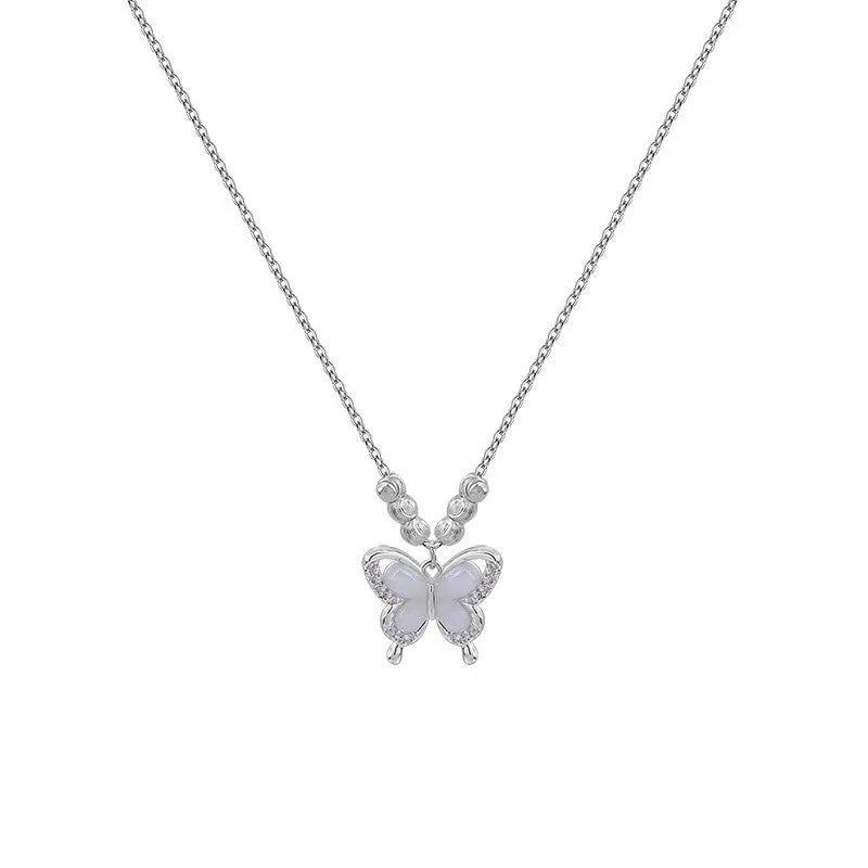 Women's silver necklace with opal butterfly charm on adjustable 925 sterling silver chain