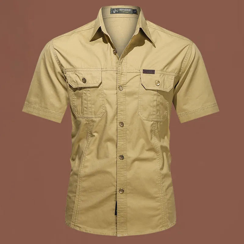 Men's short sleeve cotton work shirt in a loose cardigan style, shown in one of eight available colours.