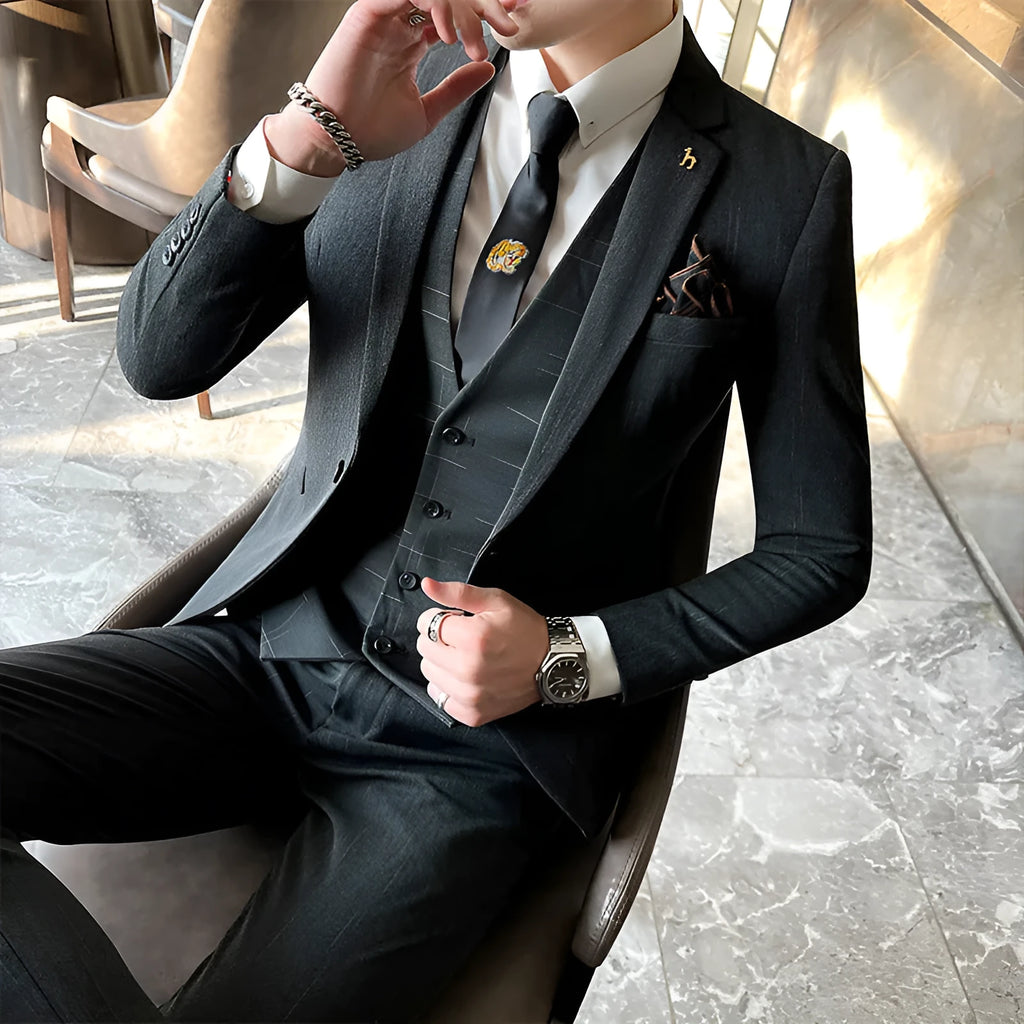Men's slim fit business suit in black cotton blend fabric with structured tailoring
