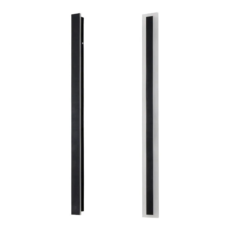 A long, straight outdoor LED wall lamp with a black wrought iron shell, mounted on a brick wall.