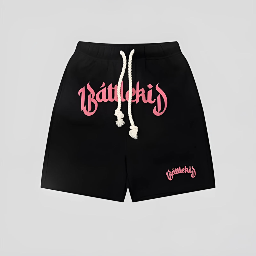 Loose cotton-blend cropped shorts in black, yellow, blue, and grey for street style.