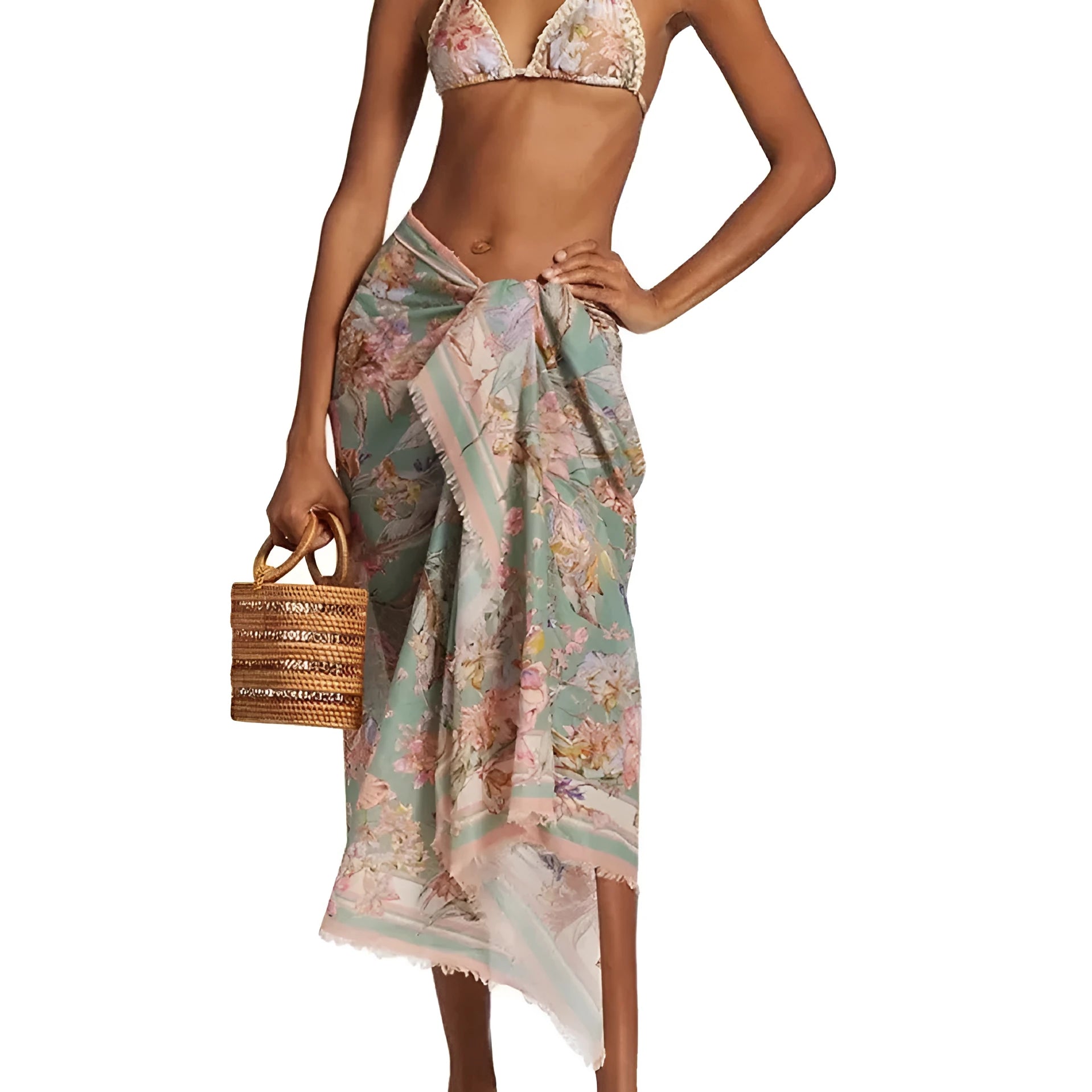 Women's creamy-white floral bikini set with halter top, briefs, and skirt