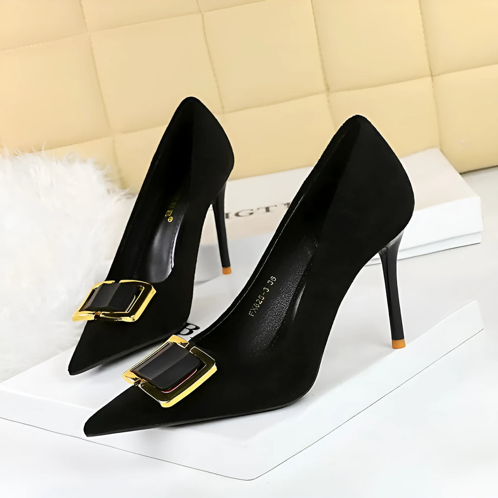 Black suede women's stiletto high heels with a 9cm heel and shallow cut, pointed toe.