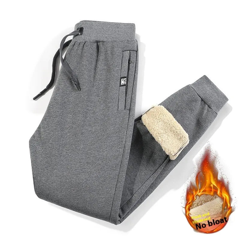 Men's grey fleece-lined cotton track pants with elastic waist and straight leg
