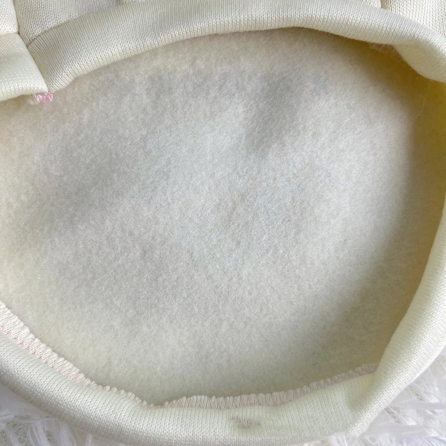 Korean cartoon plush dog clothes in polyester hoodie style, beige colour, on a small dog