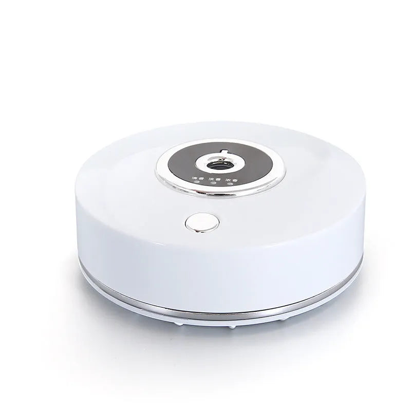 USB vehicle mounted spray aromatherapy machine in black, grey, or white for car cabin air freshening
