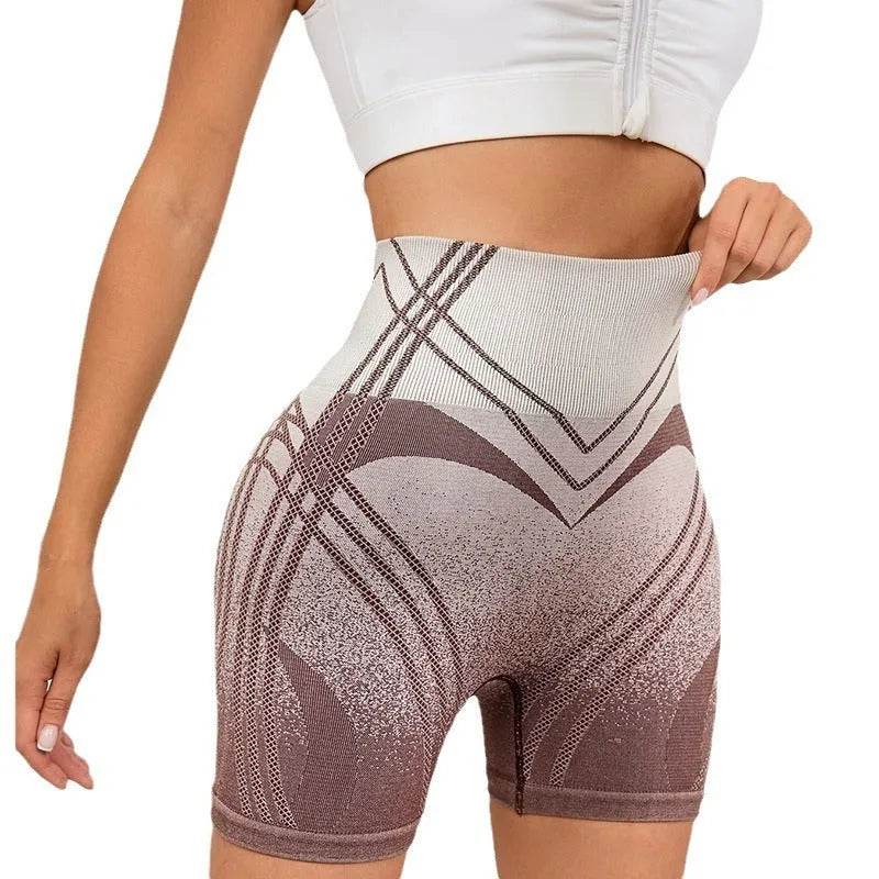 Women's high-waisted fitness shorts with gradient colour pattern in black and brown options