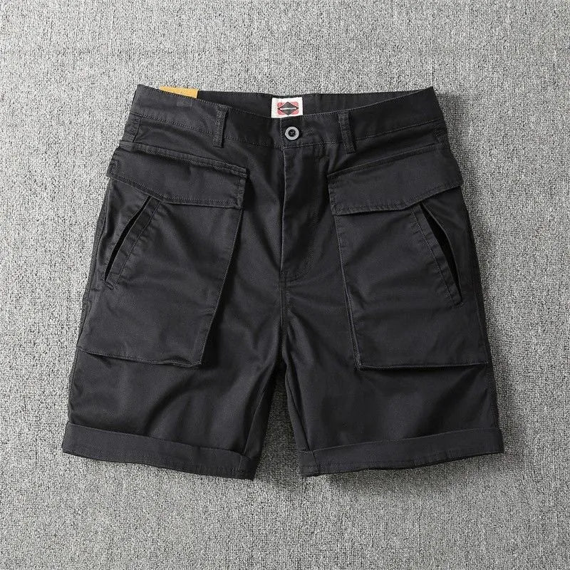 Men's straight leg cotton cargo shorts in khaki with multiple pockets and elastic waistband.