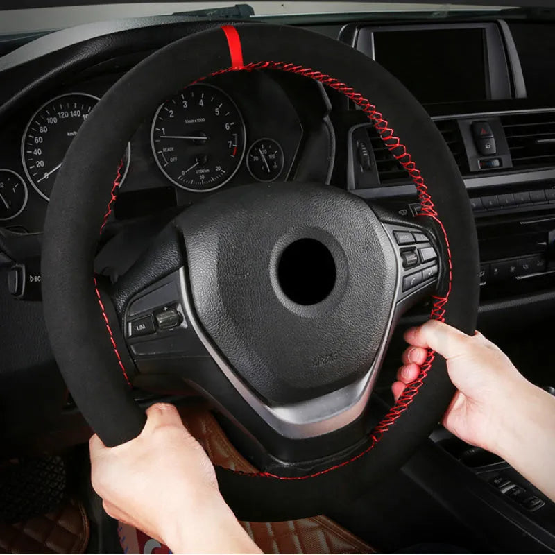 Suede microfiber steering wheel cover with black stitching, fitted on a car steering wheel, 38cm diameter