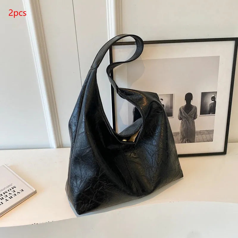 Soft leather casual shoulder bag with large capacity and street trend design in multiple colour options