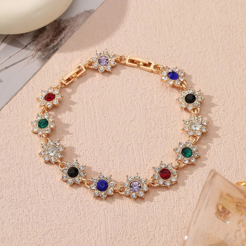 Women's zinc alloy floral bracelet with electroplated finish showing colour variations