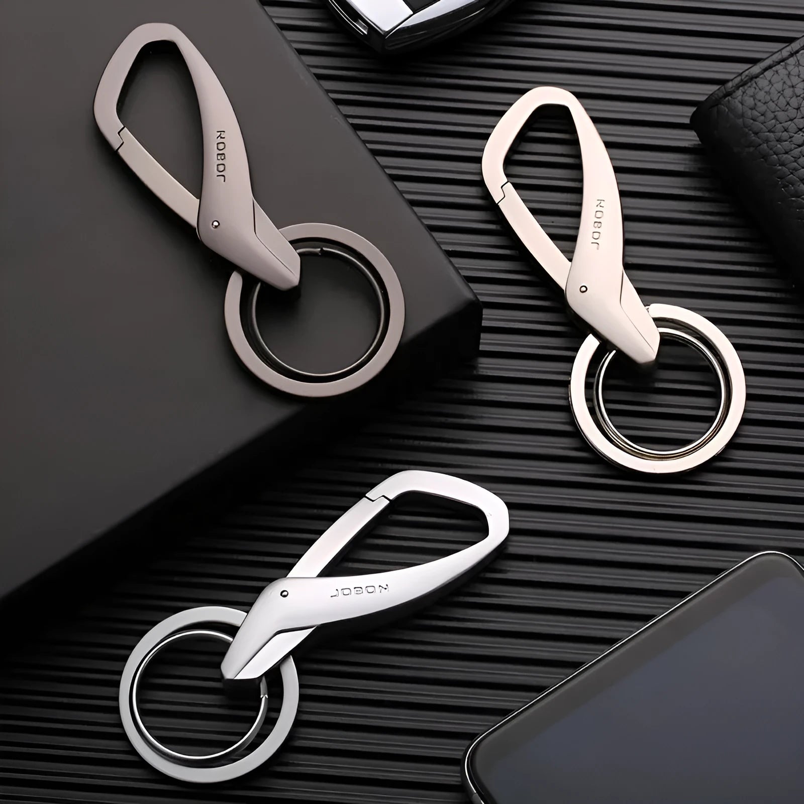 Zinc alloy double ring waist keychain for car keys in black, chrome, and nickel colours.