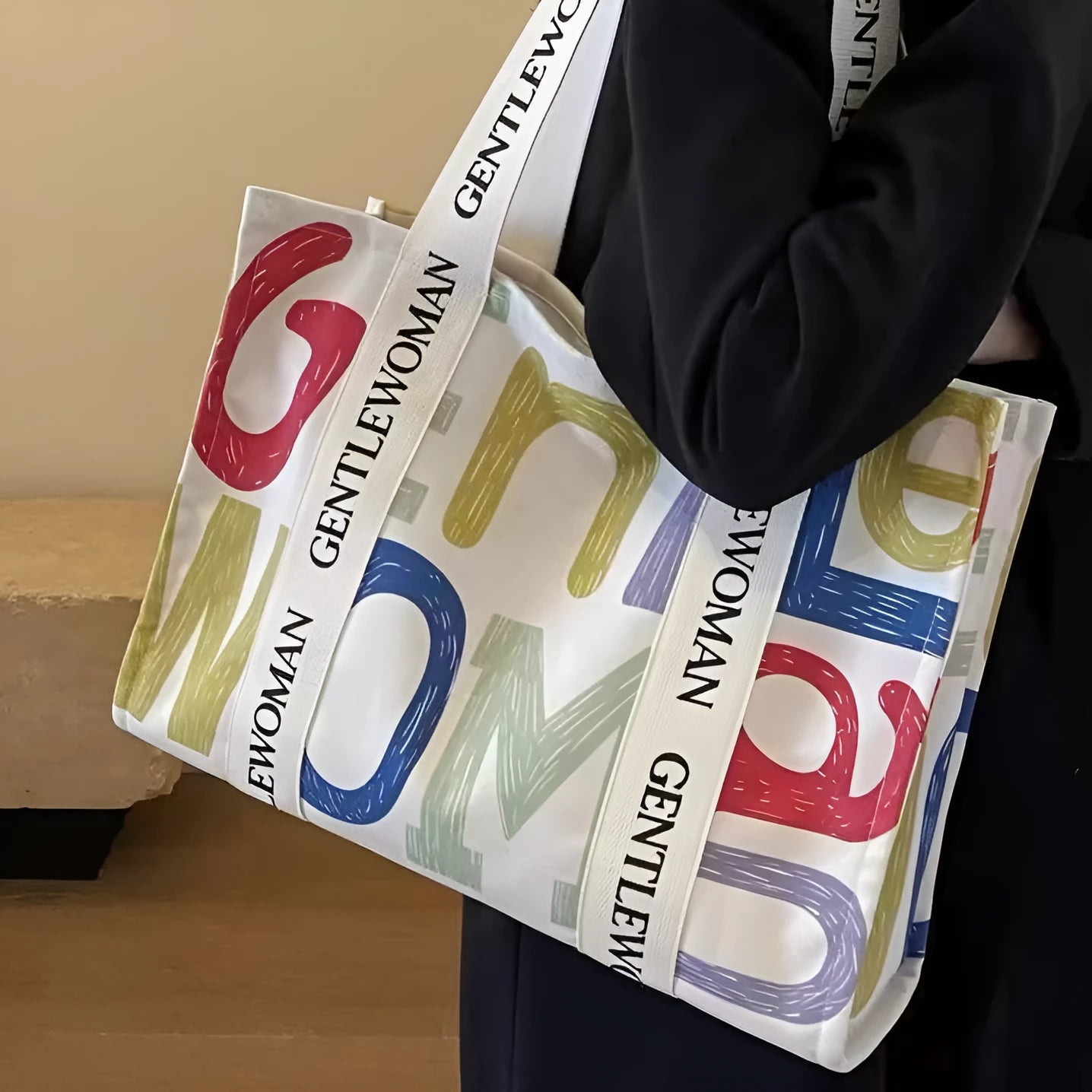 Large canvas shoulder tote bag with printed design, shown in available colour and pattern options.