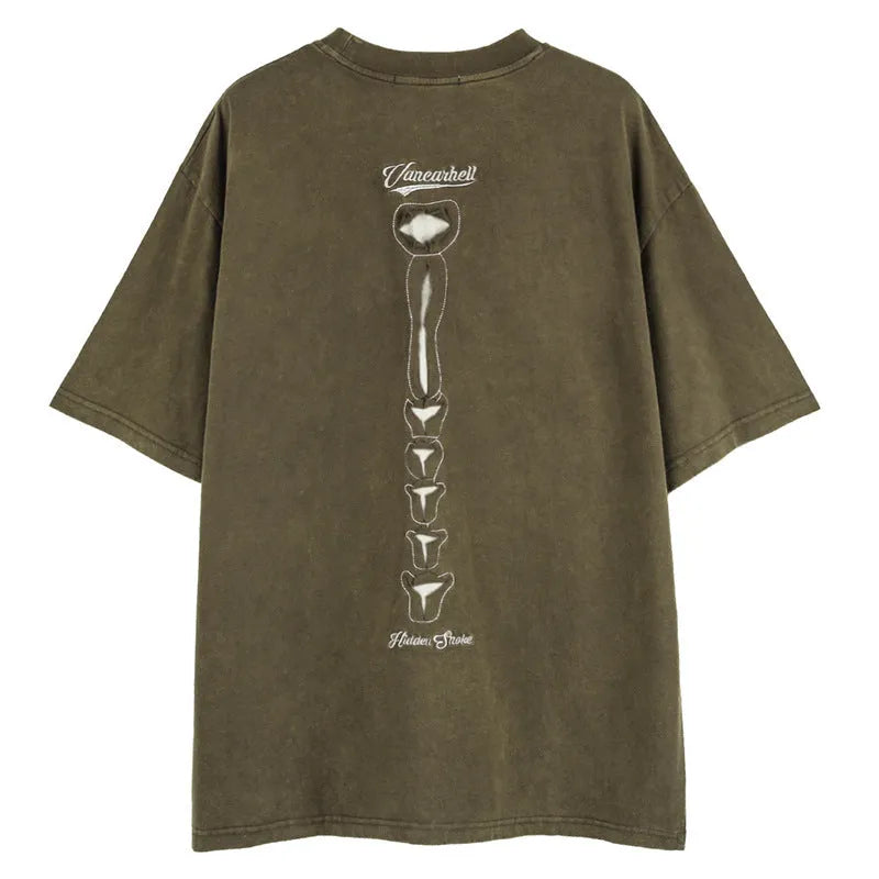 Men's black cotton t-shirt with skull and letter print, showing loose fit and drop-shoulder sleeves.