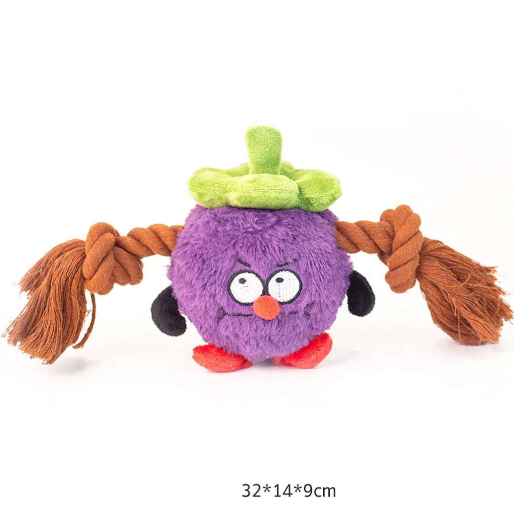 Green interactive dog plush rope knot tug toy with molar tooth chew centre on a white background.