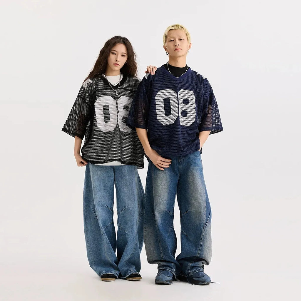 Loose fit black half sleeve pullover shirt with white letter pattern design on the front.