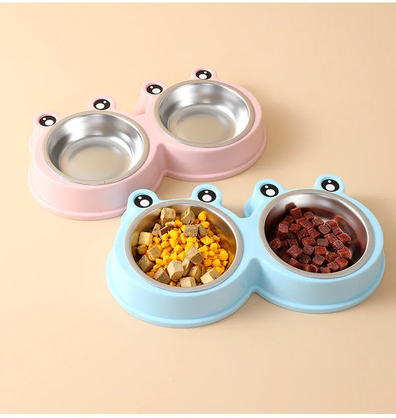 Blue double compartment pet feeding bowl with stainless steel frog-shaped water bowl attached.