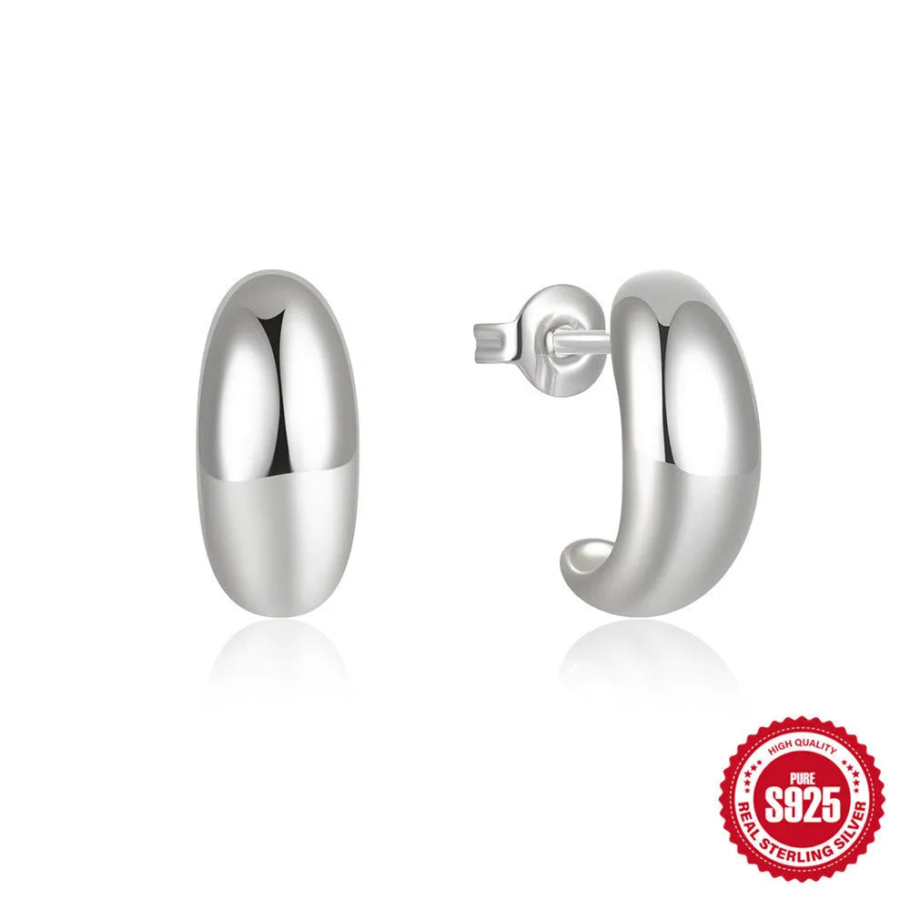 C-shaped geometric earring in sterling silver with gold electroplated finish