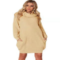 A woman's apricot-coloured pullover sweater with a V-neck lapel collar and side pockets on a hanger.