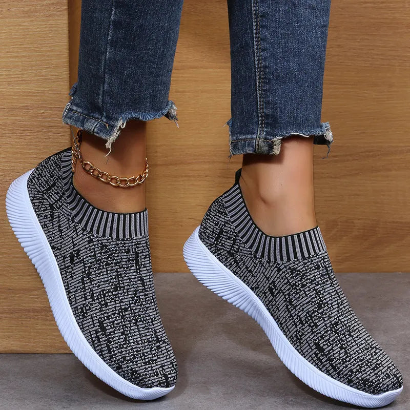 Unisex stripe knit sock shoes in white with low-top design and EVA sole for running and walking